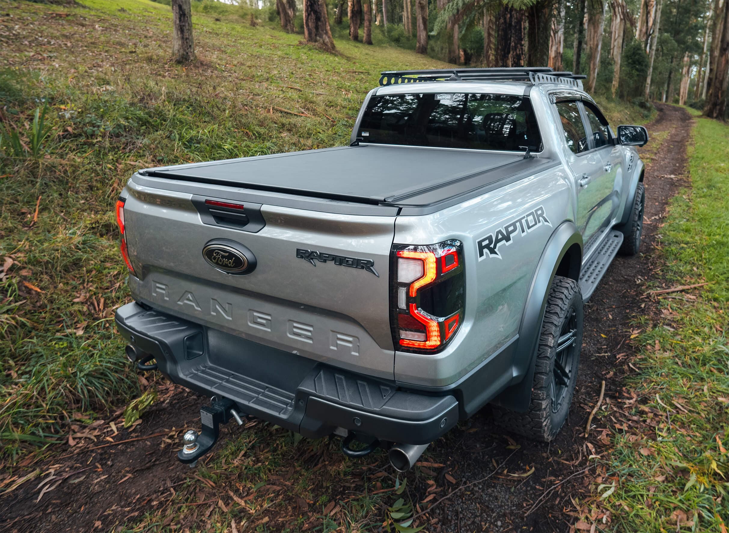 SP Roll Mate manual roll-up cover open showing full tub access on Ford Ranger Raptor