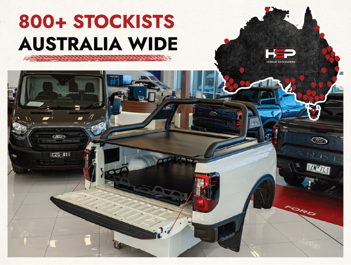 Display tub at dealership featuring ute sports bar, tray slider, and ute roller cover setup for showcasing ute accessory options.